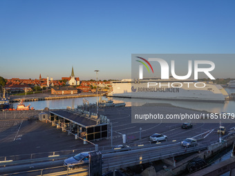 A general view of the ferry terminal in the port with a Bornholmslinjen ferry in the background is seen in Ronne, Bornholm Island, Denmark,...