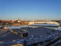 A general view of the ferry terminal in the port with a Bornholmslinjen ferry in the background is seen in Ronne, Bornholm Island, Denmark,...