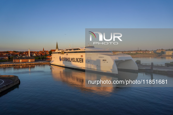 A general view of the ferry terminal in the port with a Bornholmslinjen ferry in the background is seen in Ronne, Bornholm Island, Denmark,...