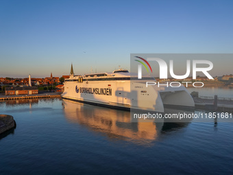 A general view of the ferry terminal in the port with a Bornholmslinjen ferry in the background is seen in Ronne, Bornholm Island, Denmark,...