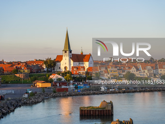 A general view of the city during the summer sunset is seen in Ronne, Bornholm Island, Denmark, on August 6, 2024. (