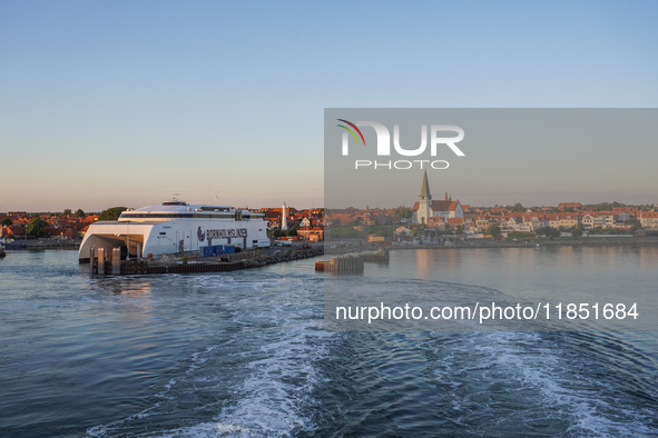 A general view of the ferry terminal in the port with a Bornholmslinjen ferry in the background is seen in Ronne, Bornholm Island, Denmark,...