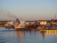 A general view of the port during sunset is seen in Ronne, Bornholm Island, Denmark, on August 6, 2024. (