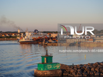 A general view of the port during sunset is seen in Ronne, Bornholm Island, Denmark, on August 6, 2024. (