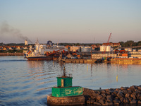 A general view of the port during sunset is seen in Ronne, Bornholm Island, Denmark, on August 6, 2024. (