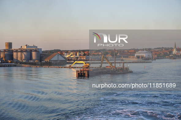 A general view of the port during sunset is seen in Ronne, Bornholm Island, Denmark, on August 6, 2024. 