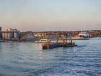 A general view of the port during sunset is seen in Ronne, Bornholm Island, Denmark, on August 6, 2024. (