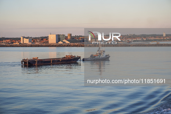 A general view of the port during sunset is seen in Ronne, Bornholm Island, Denmark, on August 6, 2024. 