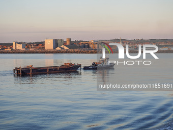 A general view of the port during sunset is seen in Ronne, Bornholm Island, Denmark, on August 6, 2024. (