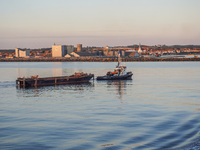 A general view of the port during sunset is seen in Ronne, Bornholm Island, Denmark, on August 6, 2024. (