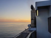 A general view of the port during sunset is seen in Ronne, Bornholm Island, Denmark, on August 6, 2024. (