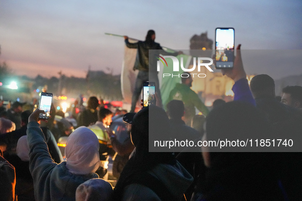 Syrians Gather In The Umayyad Square In The Heart Of Damascus To Celebrate The Fall Of The Assad Regime On December 9, 2024.