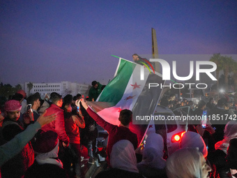 Syrians Gather In The Umayyad Square In The Heart Of Damascus To Celebrate The Fall Of The Assad Regime On December 9, 2024.(