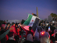 Syrians Gather In The Umayyad Square In The Heart Of Damascus To Celebrate The Fall Of The Assad Regime On December 9, 2024.(