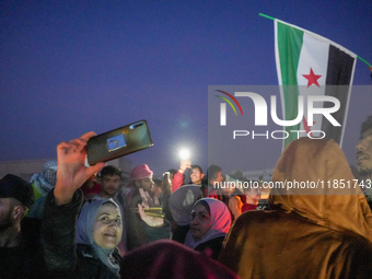 Syrians Gather In The Umayyad Square In The Heart Of Damascus To Celebrate The Fall Of The Assad Regime On December 9, 2024.(