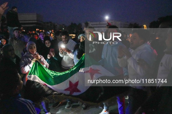 Syrians Gather In The Umayyad Square In The Heart Of Damascus To Celebrate The Fall Of The Assad Regime On December 9, 2024.