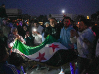 Syrians Gather In The Umayyad Square In The Heart Of Damascus To Celebrate The Fall Of The Assad Regime On December 9, 2024.(