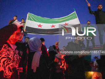 Syrians Gather In The Umayyad Square In The Heart Of Damascus To Celebrate The Fall Of The Assad Regime On December 9, 2024.(