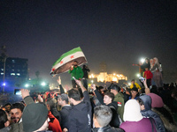 Syrians Gather In The Umayyad Square In The Heart Of Damascus To Celebrate The Fall Of The Assad Regime On December 9, 2024.(