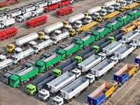 A large number of trucks and construction machinery gather at Yantai Port to be loaded for export in Yantai, Shandong province, China, on De...