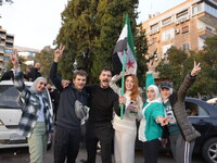 Syrians gather in the Abu Rummaneh neighborhood in central Damascus to celebrate the fall of the Assad regime on December 9, 2024. (