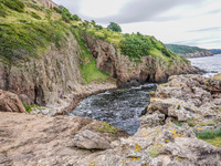 The rocky Baltis sea coast is seen near Hammershus on Bornholm Island, Denmark, on August 5, 2024. (