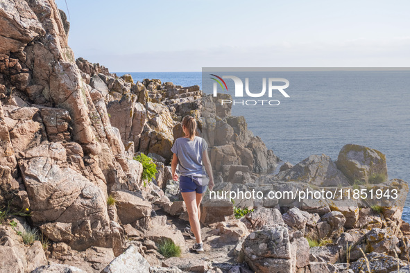 The rocky Baltic Sea coast is seen in Gudhjem, Bornholm Island, Denmark, on August 5, 2024. 