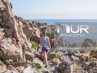 The rocky Baltic Sea coast is seen in Gudhjem, Bornholm Island, Denmark, on August 5, 2024. (