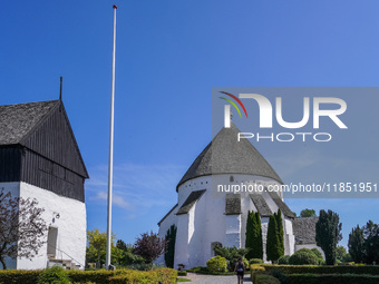 Osterlars Church is seen on Bornholm Island, Denmark, on August 6, 2024. Built around 1160, it consists of an apse, an oval chancel, a large...