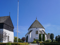 Osterlars Church is seen on Bornholm Island, Denmark, on August 6, 2024. Built around 1160, it consists of an apse, an oval chancel, a large...