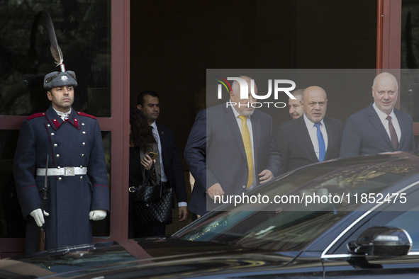 The leader of the party GERB (Citizens for European Development of Bulgaria), Boyko Borisov, stands in front of the Presidency building afte...