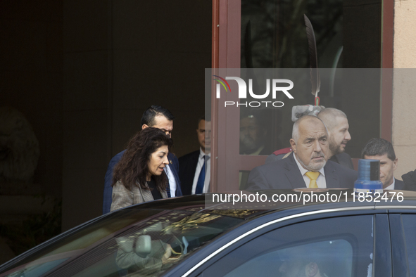 The leader of the party GERB (Citizens for European Development of Bulgaria), Boyko Borisov, stands in front of the Presidency building afte...