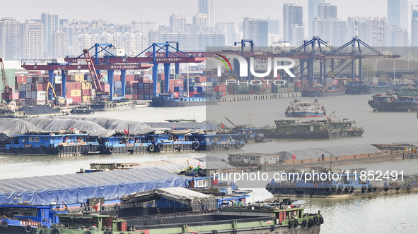 Cargo ships load and unload containers at the Port of Huai'an in Jiangsu province, China, on December 10, 2024. 