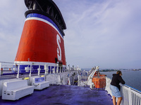 People on board the Stena Line Ferry look at the Sweden Baltic Sea coast in Karlskrona, Sweden, on August 16, 2024. (