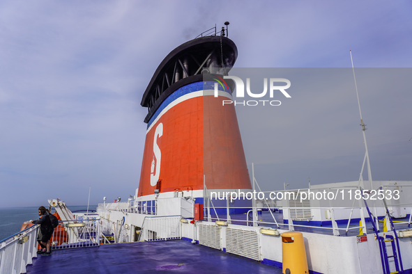 People on board the Stena Line Ferry look at the Sweden Baltic Sea coast in Karlskrona, Sweden, on August 16, 2024. 