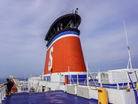 People on board the Stena Line Ferry look at the Sweden Baltic Sea coast in Karlskrona, Sweden, on August 16, 2024. (