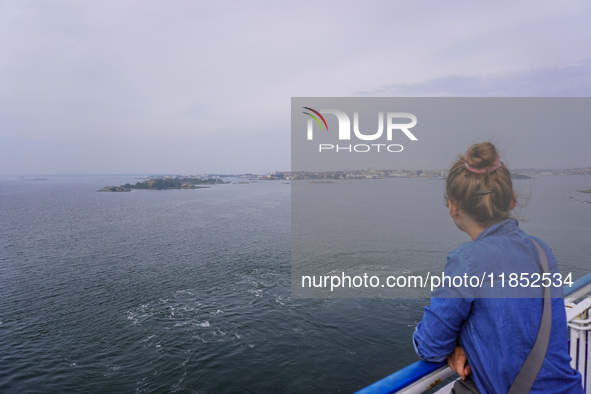 People on board the Stena Line Ferry look at the Sweden Baltic Sea coast in Karlskrona, Sweden, on August 16, 2024. 