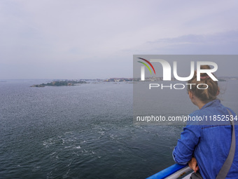 People on board the Stena Line Ferry look at the Sweden Baltic Sea coast in Karlskrona, Sweden, on August 16, 2024. (