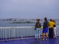 People on board the Stena Line Ferry look at the Sweden Baltic Sea coast in Karlskrona, Sweden, on August 16, 2024. (