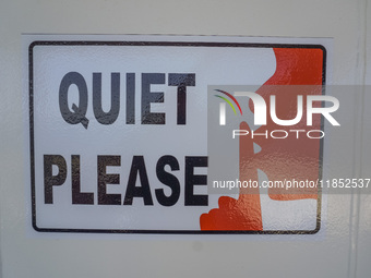 A ''Quiet Please'' sign on board a Stena Line Ferry is visible while looking at the Sweden Baltic Sea coast in Karlskrona, Sweden, on August...