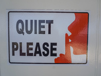 A ''Quiet Please'' sign on board a Stena Line Ferry is visible while looking at the Sweden Baltic Sea coast in Karlskrona, Sweden, on August...