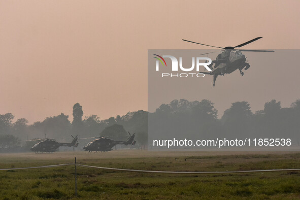 Indian Army helicopters take part in a practice run for the upcoming Vijay Diwas celebrations in Kolkata, India, on December 10, 2024. Vijay...