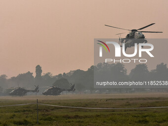 Indian Army helicopters take part in a practice run for the upcoming Vijay Diwas celebrations in Kolkata, India, on December 10, 2024. Vijay...