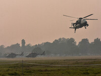 Indian Army helicopters take part in a practice run for the upcoming Vijay Diwas celebrations in Kolkata, India, on December 10, 2024. Vijay...