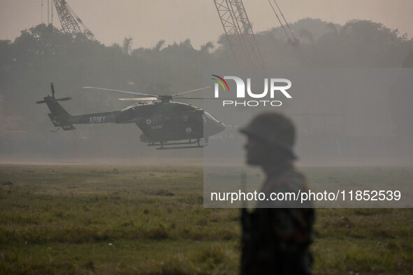 Indian Army helicopters take part in a practice run for the upcoming Vijay Diwas celebrations in Kolkata, India, on December 10, 2024. Vijay...