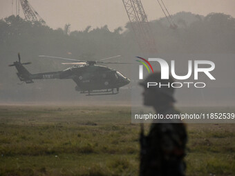 Indian Army helicopters take part in a practice run for the upcoming Vijay Diwas celebrations in Kolkata, India, on December 10, 2024. Vijay...