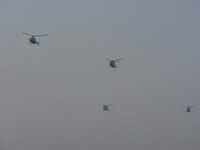 Indian Army helicopters take part in a practice run for the upcoming Vijay Diwas celebrations in Kolkata, India, on December 10, 2024. Vijay...