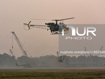 Indian Army helicopters take part in a practice run for the upcoming Vijay Diwas celebrations in Kolkata, India, on December 10, 2024. Vijay...