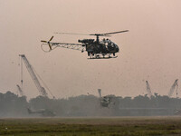 Indian Army helicopters take part in a practice run for the upcoming Vijay Diwas celebrations in Kolkata, India, on December 10, 2024. Vijay...