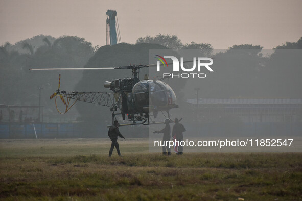 Indian Army helicopters take part in a practice run for the upcoming Vijay Diwas celebrations in Kolkata, India, on December 10, 2024. Vijay...